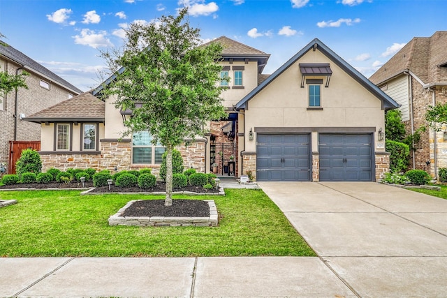 1010 Zoyas Creek Trl, Katy, TX 77494 - view of front of house featuring stucco siding, stone siding, a front lawn, concrete driveway, and an attached garage
