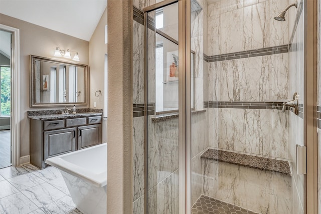 1010 Zoyas Creek Trl, Katy, TX 77494 - bathroom with a stall shower, a freestanding tub, vanity, marble finish floors, and lofted ceiling