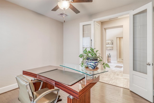 1010 Zoyas Creek Trl, Katy, TX 77494 - home office with baseboards, light wood-type flooring, and a ceiling fan