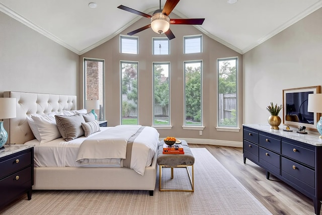 1010 Zoyas Creek Trl, Katy, TX 77494 - bedroom featuring light wood-style floors, lofted ceiling, crown molding, baseboards, and a ceiling fan