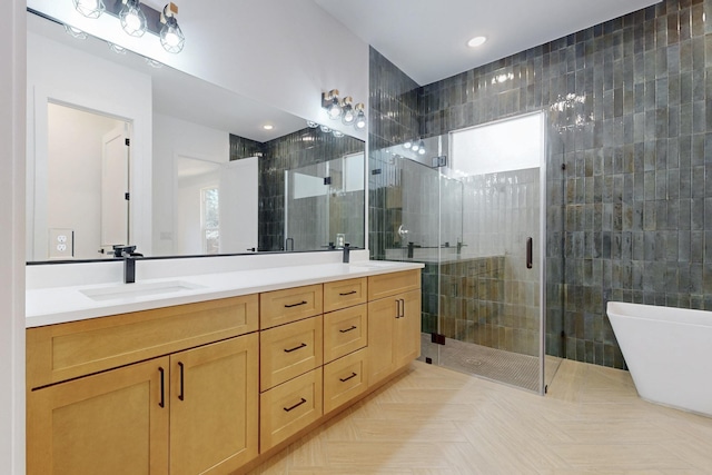 117 Keaau Ct, Bastrop, TX 78602 - full bath with healthy amount of natural light, tile walls, a shower stall, double vanity, and a freestanding tub