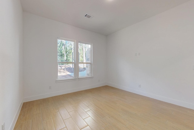 117 Keaau Ct, Bastrop, TX 78602 - unfurnished room with light wood-style floors and baseboards