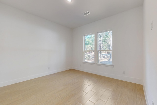 117 Keaau Ct, Bastrop, TX 78602 - unfurnished room featuring baseboards and light wood-style floors