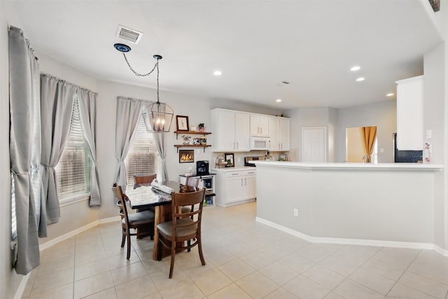 9034 Cedar Run Fls, Tomball, TX 77375 - dining space with recessed lighting, baseboards, and light tile patterned floors