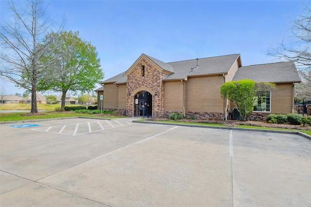 9034 Cedar Run Fls, Tomball, TX 77375 - view of building exterior with uncovered parking