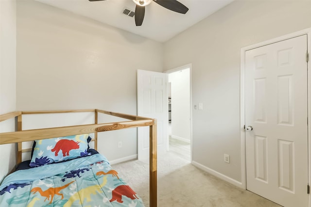 9819 Orangevale Dr, Spring, TX 77379 - carpeted bedroom with baseboards and a ceiling fan