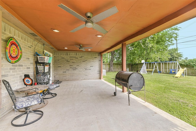 9819 Orangevale Dr, Spring, TX 77379 - view of patio with a playground, a ceiling fan, and a grill