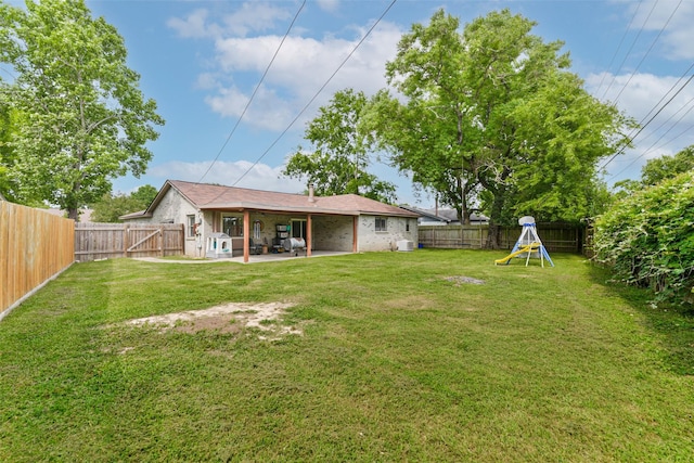 9819 Orangevale Dr, Spring, TX 77379 - view of yard with a patio and a playground