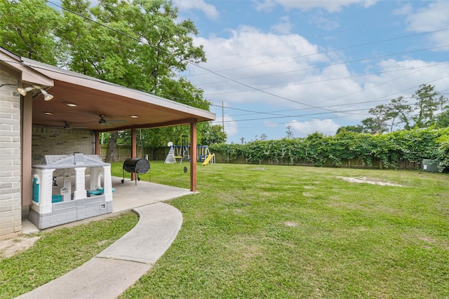9819 Orangevale Dr, Spring, TX 77379 - view of yard with a playground, a patio area, and a ceiling fan