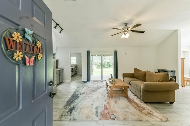 9819 Orangevale Dr, Spring, TX 77379 - living area featuring ceiling fan and rail lighting