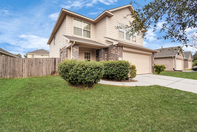 8907 Wildbird Ln, Humble, TX 77338 - traditional home featuring a garage, driveway, and brick siding