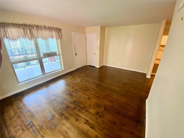 11550 Chimney Rock Rd Unit 329, Houston, TX 77035 - spare room with dark wood-style floors and baseboards