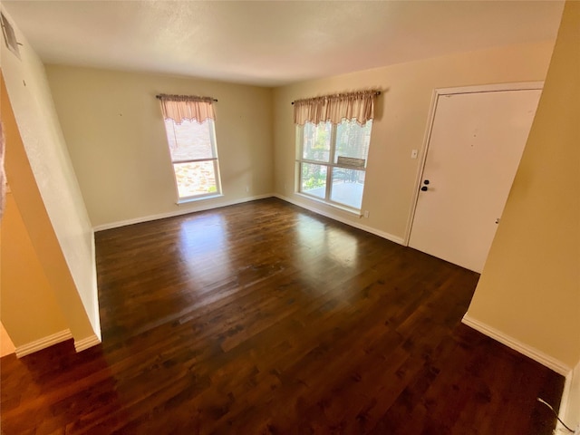 11550 Chimney Rock Rd Unit 329, Houston, TX 77035 - unfurnished room with dark wood-type flooring and baseboards