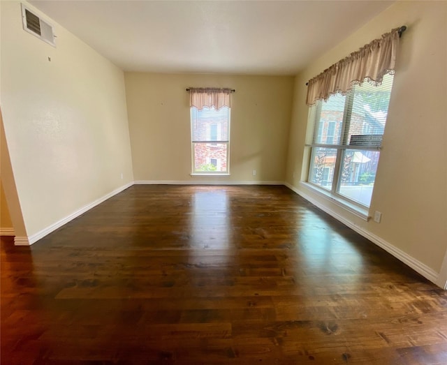 11550 Chimney Rock Rd Unit 329, Houston, TX 77035 - unfurnished room featuring dark wood-type flooring and baseboards