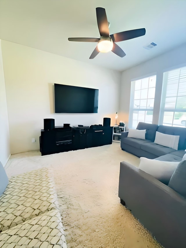 7927 Tindarey Maple Trce, Richmond, TX 77407 - carpeted living area with a ceiling fan