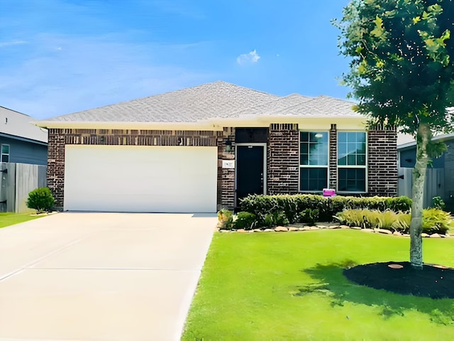 7927 Tindarey Maple Trce, Richmond, TX 77407 - view of front of house with a garage, driveway, and brick siding