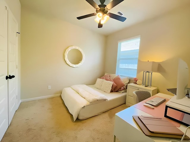 7927 Tindarey Maple Trce, Richmond, TX 77407 - bedroom with carpet floors, an office area, baseboards, and a ceiling fan