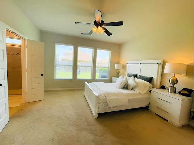 7927 Tindarey Maple Trce, Richmond, TX 77407 - bedroom featuring light carpet, a ceiling fan, and baseboards