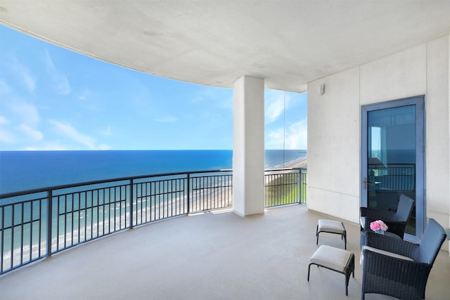 801 E Beach Dr Unit Tw2806, Galveston, TX 77550 - balcony with view of water and beach