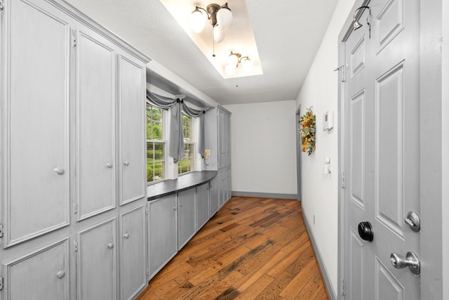 13106 Lookout Mountain Ct, Houston, TX 77069 - corridor featuring light wood-style flooring and baseboards