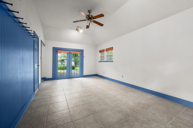 13106 Lookout Mountain Ct, Houston, TX 77069 - tiled empty room featuring vaulted ceiling, a ceiling fan, and french doors