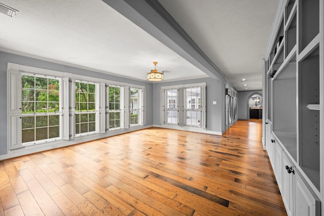 13106 Lookout Mountain Ct, Houston, TX 77069 - unfurnished living room featuring wood-type flooring, french doors, recessed lighting, a chandelier, and a textured ceiling