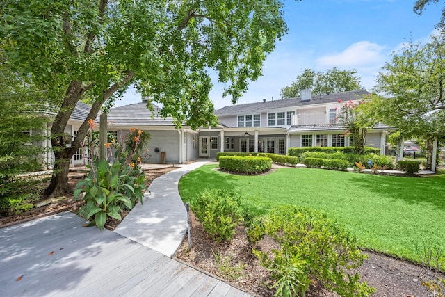 13106 Lookout Mountain Ct, Houston, TX 77069 - view of front facade featuring a front yard and a chimney