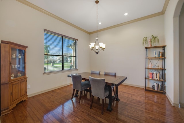 14610 Thunder Bay, Beach City, TX 77523 - dining area featuring wood finished floors, a chandelier, ornamental molding, baseboards, and arched walkways