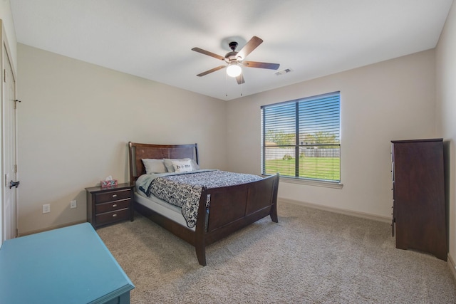 14610 Thunder Bay, Beach City, TX 77523 - carpeted bedroom with baseboards and ceiling fan