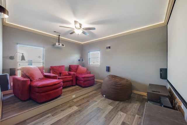 14610 Thunder Bay, Beach City, TX 77523 - living room featuring ceiling fan, wood finished floors, baseboards, and crown molding