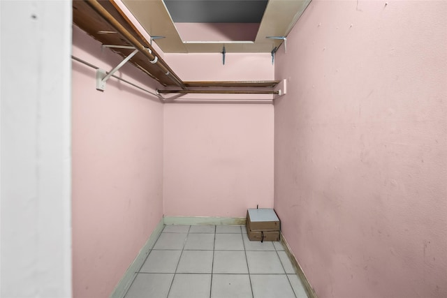 5353 Richmond Ave Unit 6, Houston, TX 77056 - spacious closet with tile patterned flooring