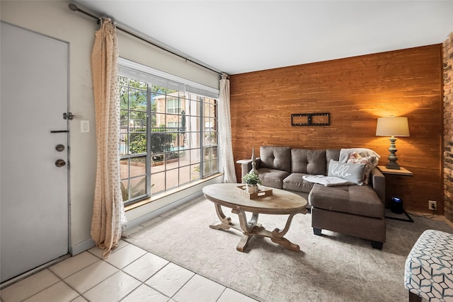 5353 Richmond Ave Unit 6, Houston, TX 77056 - living room with wooden walls and tile patterned flooring