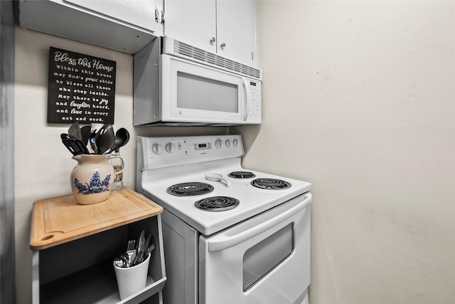 5353 Richmond Ave Unit 6, Houston, TX 77056 - kitchen with white appliances and white cabinets