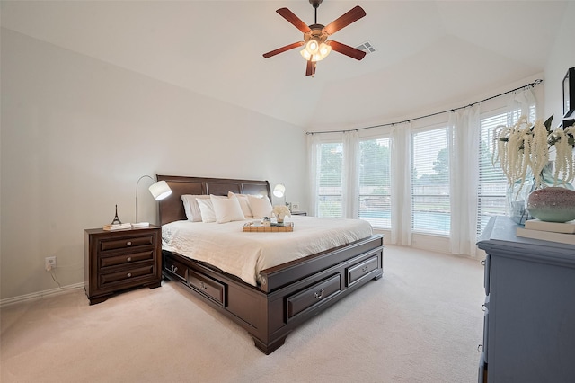 5003 Crystal Wind Ln, Katy, TX 77494 - bedroom with light carpet, vaulted ceiling, ceiling fan, and baseboards