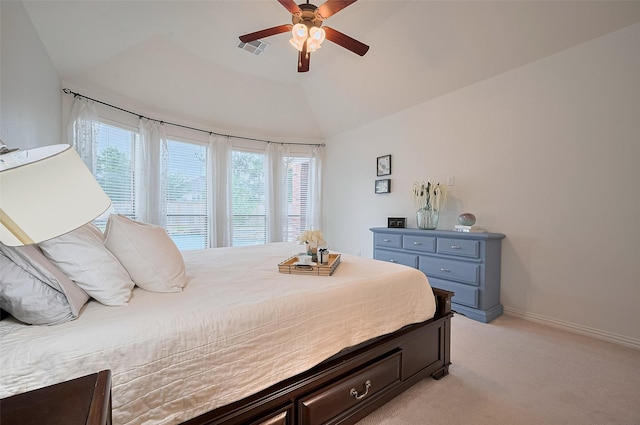 5003 Crystal Wind Ln, Katy, TX 77494 - bedroom with light carpet, lofted ceiling, a ceiling fan, and baseboards