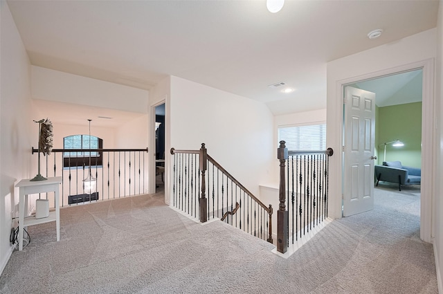 5003 Crystal Wind Ln, Katy, TX 77494 - corridor with carpet flooring and an upstairs landing