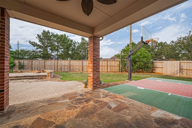 5003 Crystal Wind Ln, Katy, TX 77494 - view of patio / terrace with ceiling fan and basketball hoop