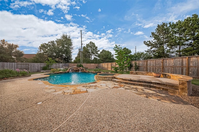 5003 Crystal Wind Ln, Katy, TX 77494 - view of swimming pool featuring a fenced backyard, a patio, and a pool with connected hot tub