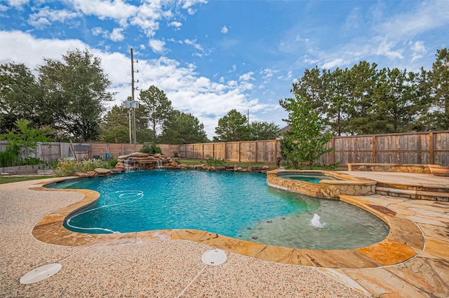 5003 Crystal Wind Ln, Katy, TX 77494 - view of swimming pool featuring a fenced backyard, a pool with connected hot tub, and a patio