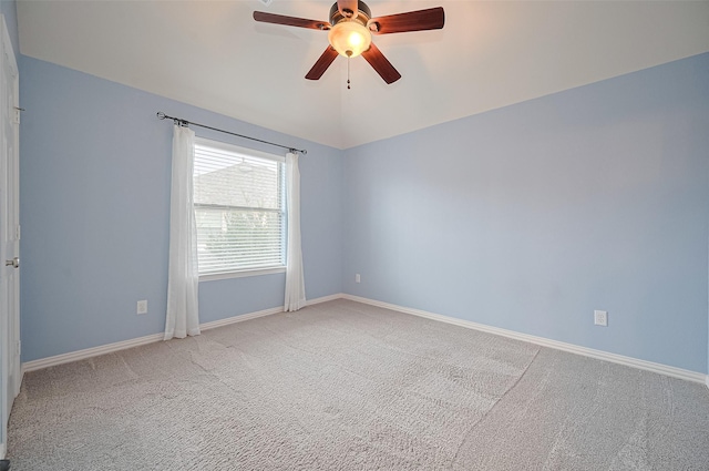 5003 Crystal Wind Ln, Katy, TX 77494 - spare room with carpet, ceiling fan, baseboards, and vaulted ceiling