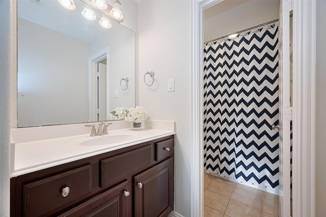 5003 Crystal Wind Ln, Katy, TX 77494 - full bath featuring vanity, a shower with curtain, and tile patterned flooring