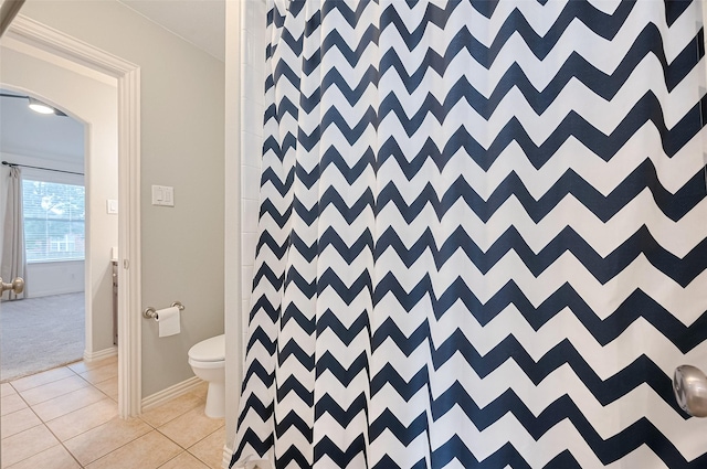 5003 Crystal Wind Ln, Katy, TX 77494 - full bathroom with toilet, a shower with curtain, and tile patterned flooring