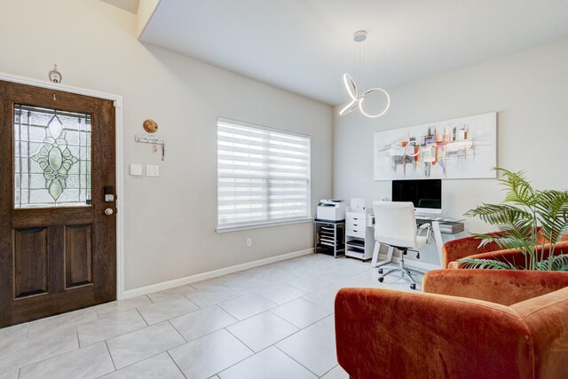 18214 Grayson Bluff Way, Richmond, TX 77407 - office area with baseboards, light tile patterned flooring, and a chandelier