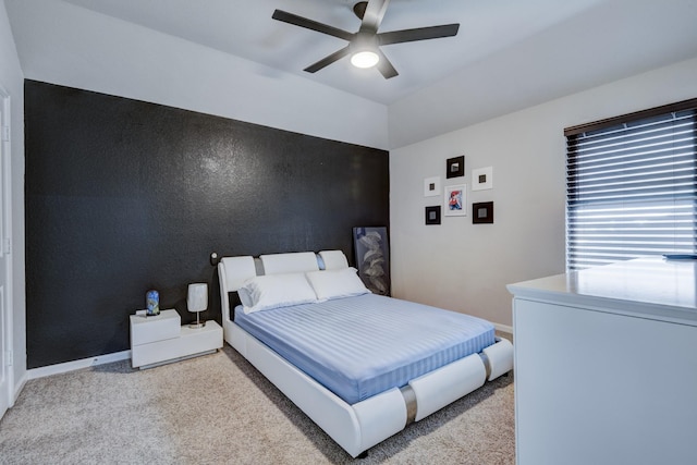 18214 Grayson Bluff Way, Richmond, TX 77407 - carpeted bedroom with baseboards and a ceiling fan