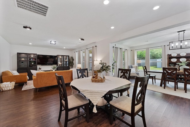 3933 Eagle Nest Lake Ln, Magnolia, TX 77354 - dining area featuring dark wood finished floors, recessed lighting, and a chandelier