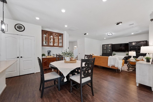 3933 Eagle Nest Lake Ln, Magnolia, TX 77354 - dining room with dark wood-style flooring and recessed lighting