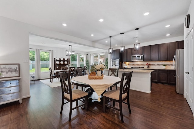 3933 Eagle Nest Lake Ln, Magnolia, TX 77354 - dining area featuring recessed lighting, dark wood-style flooring, and a chandelier