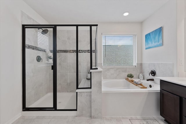 3933 Eagle Nest Lake Ln, Magnolia, TX 77354 - full bathroom with a stall shower, a bath, and vanity