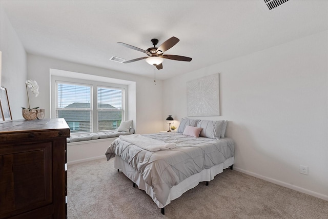 3933 Eagle Nest Lake Ln, Magnolia, TX 77354 - bedroom with baseboards, light colored carpet, and ceiling fan