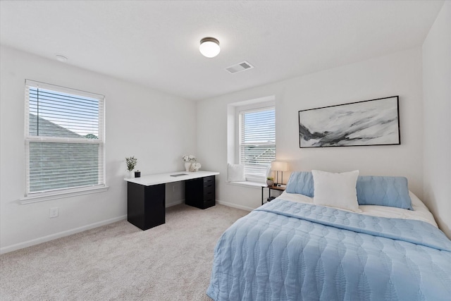 3933 Eagle Nest Lake Ln, Magnolia, TX 77354 - bedroom with baseboards and light carpet